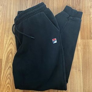 Black FILA jogger sweatpants size large, skinny fit.